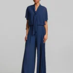 Ψηλόμεσο παντελόνι με πλισέ λεπτομέρειες LYNNE SS26