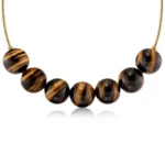 Aura Necklace Maxi Gold/Brown EDBLAD SS26